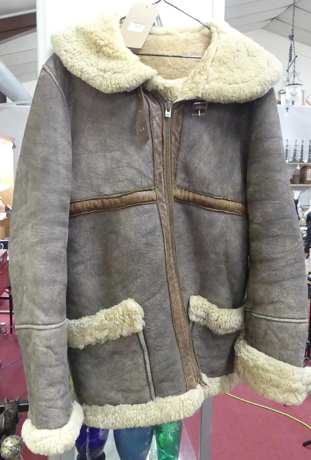 Lot 569 - Three leather and fur-lined flying jackets