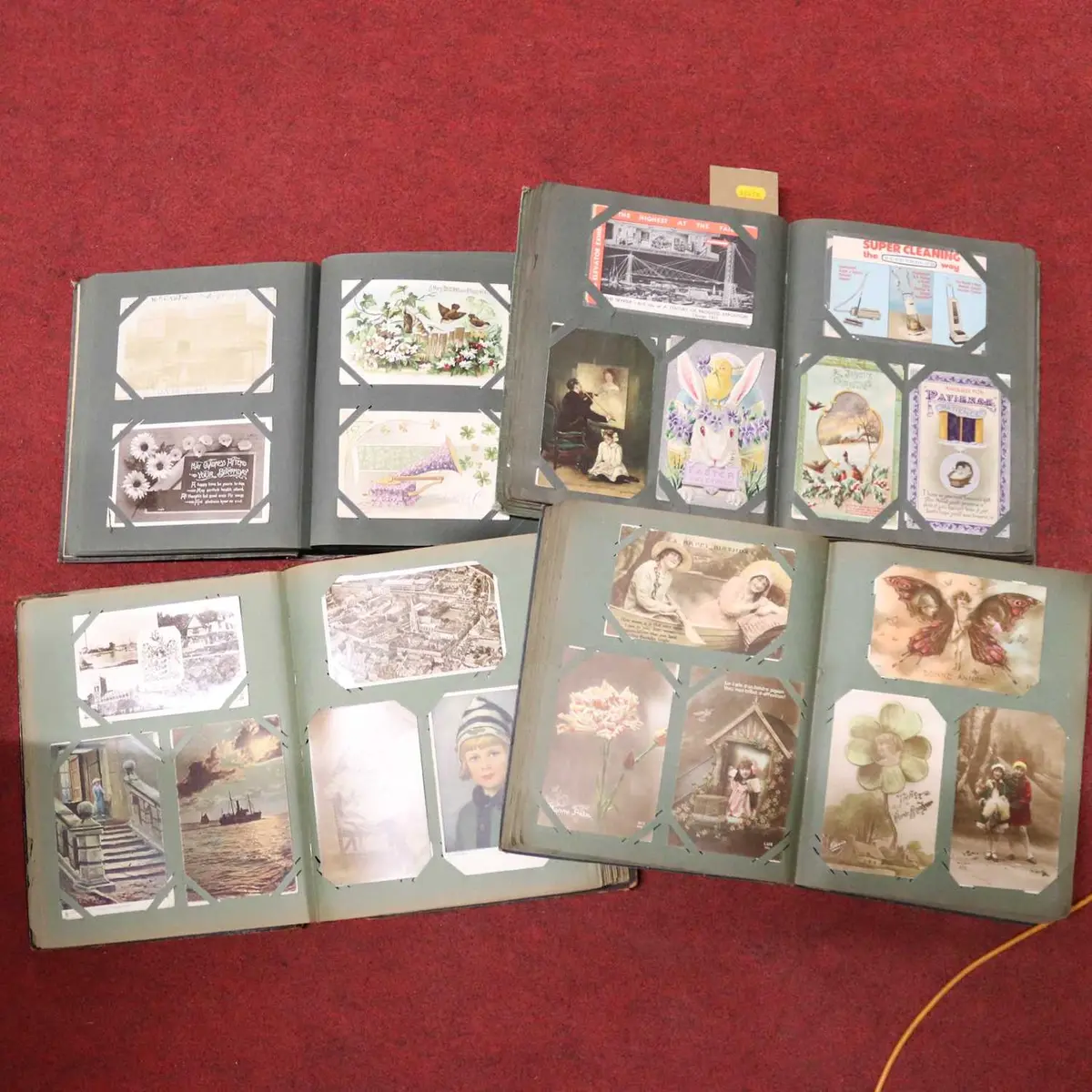 Lot 190 - Four postcard albums, early 20th century and