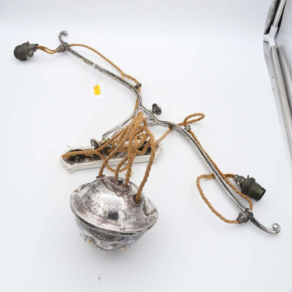 Lot 262 - An Arts & Crafts silver-plated ceiling light