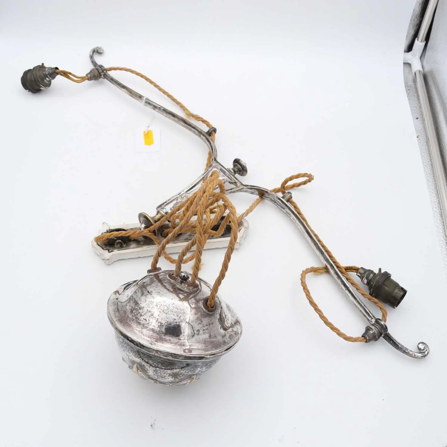 Lot 262 - An Arts & Crafts silver-plated ceiling light