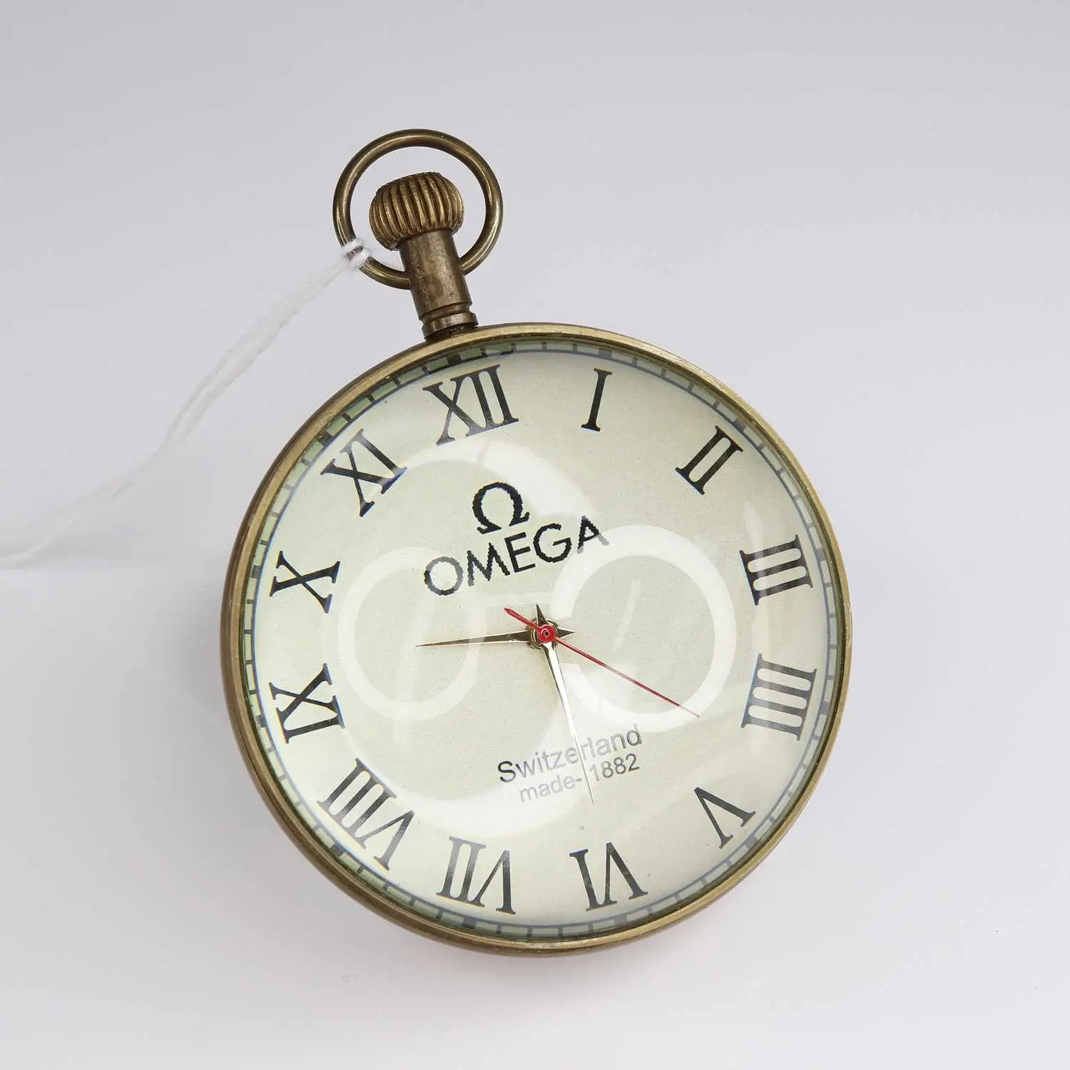 Lot 212 - A reproduction perspex and brass desk clock