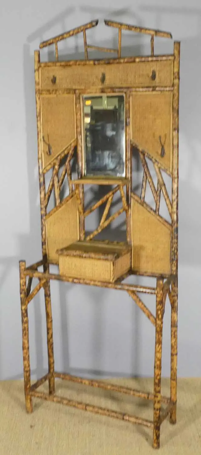 Lot 607 - A 1920s bamboo mirrorback hallstand, mounted