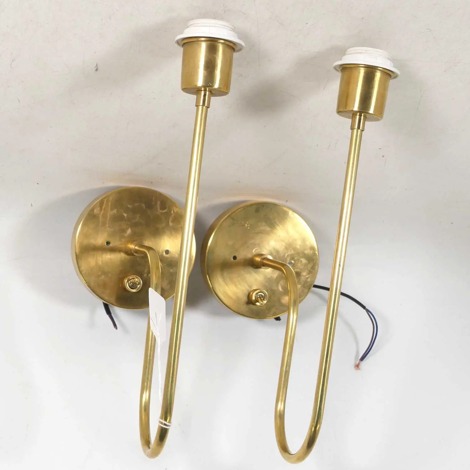 Lot 44 - A pair of contemporary brushed metal curved