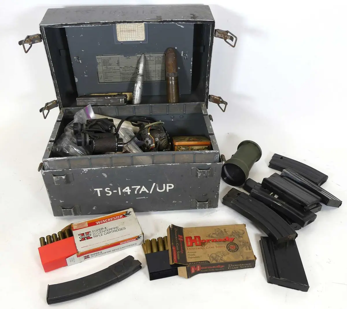 Lot 1080 - A Nato metal box containing various machine