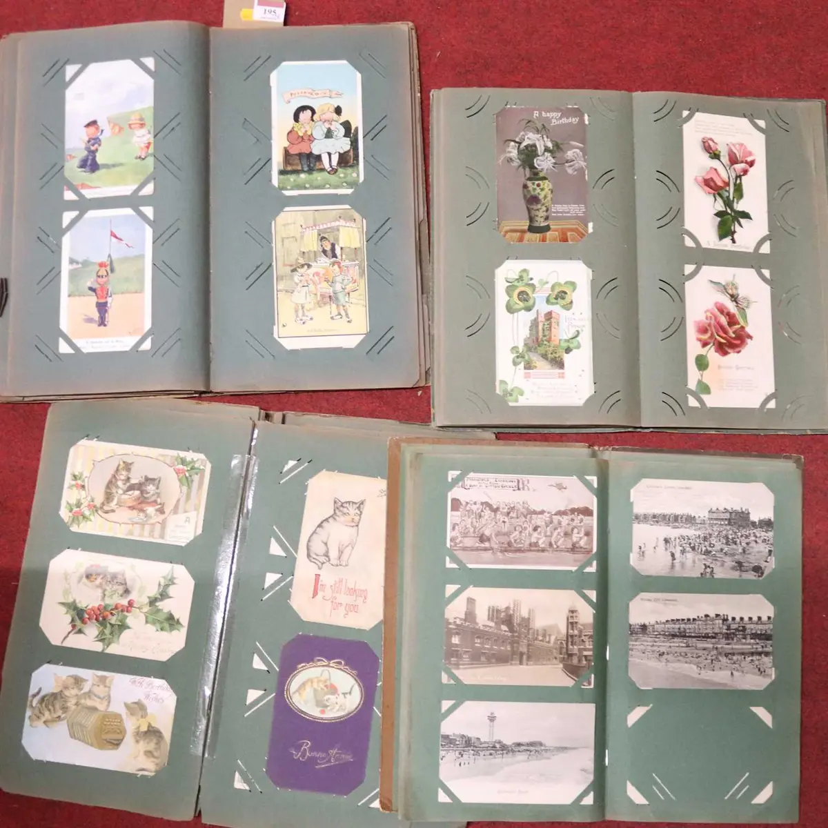 Lot 195 - Four postcard albums, early 20th century and