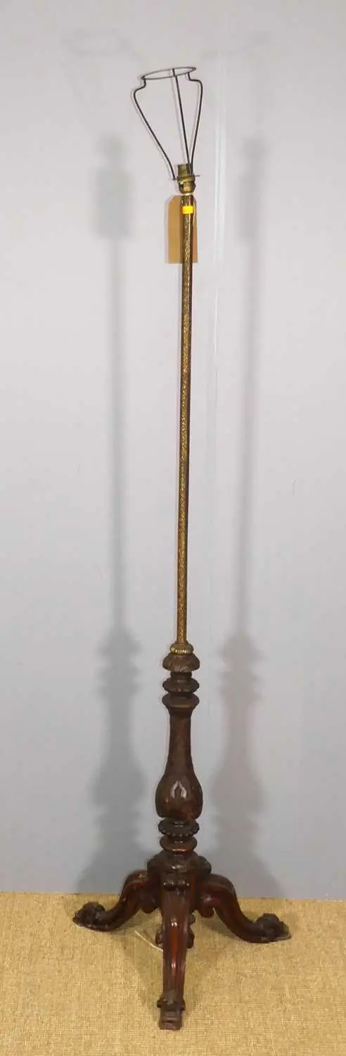 Lot 584 - A gilt metal and floral relief carved