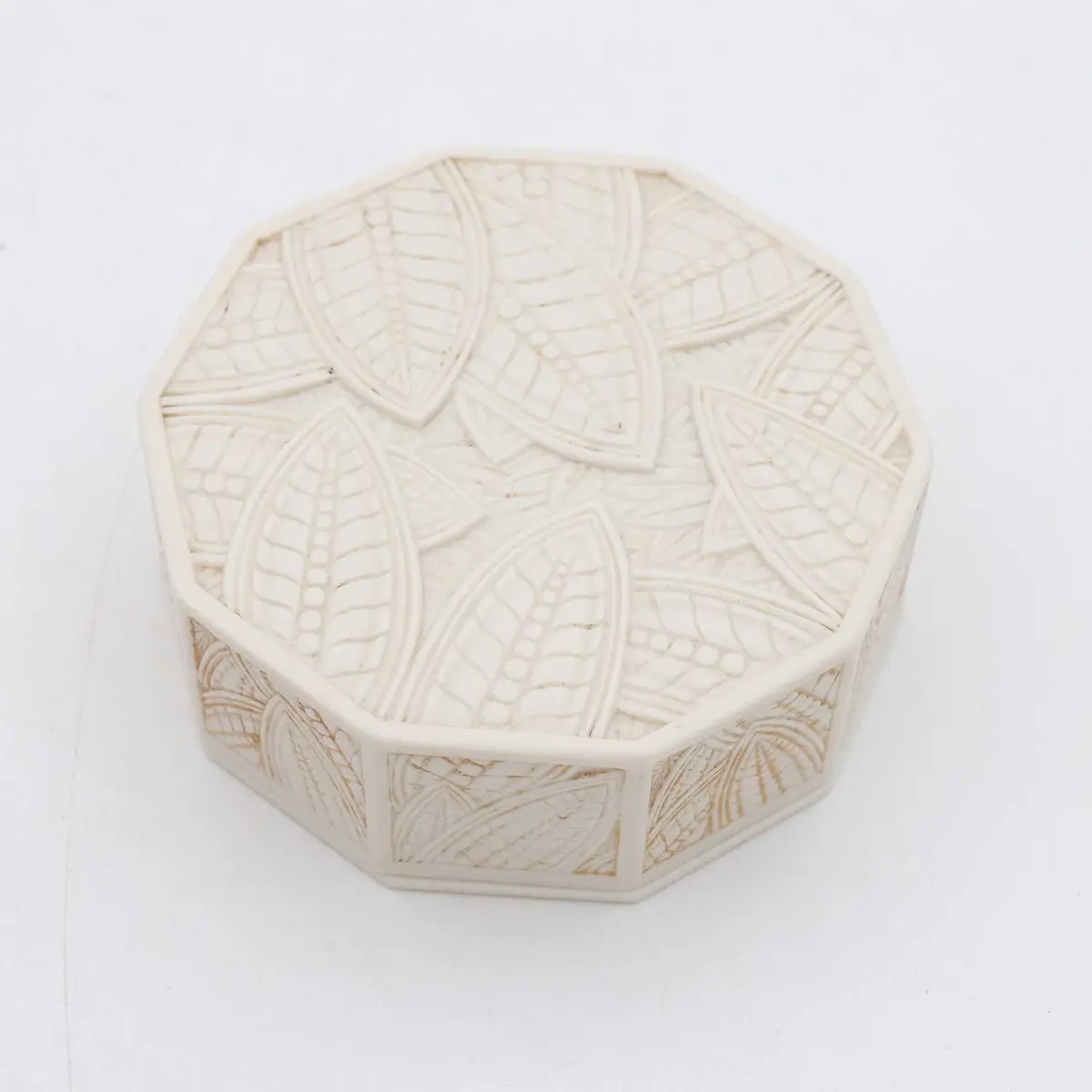 Lot 97 - An Art Deco ten-sided phenolic box, circa