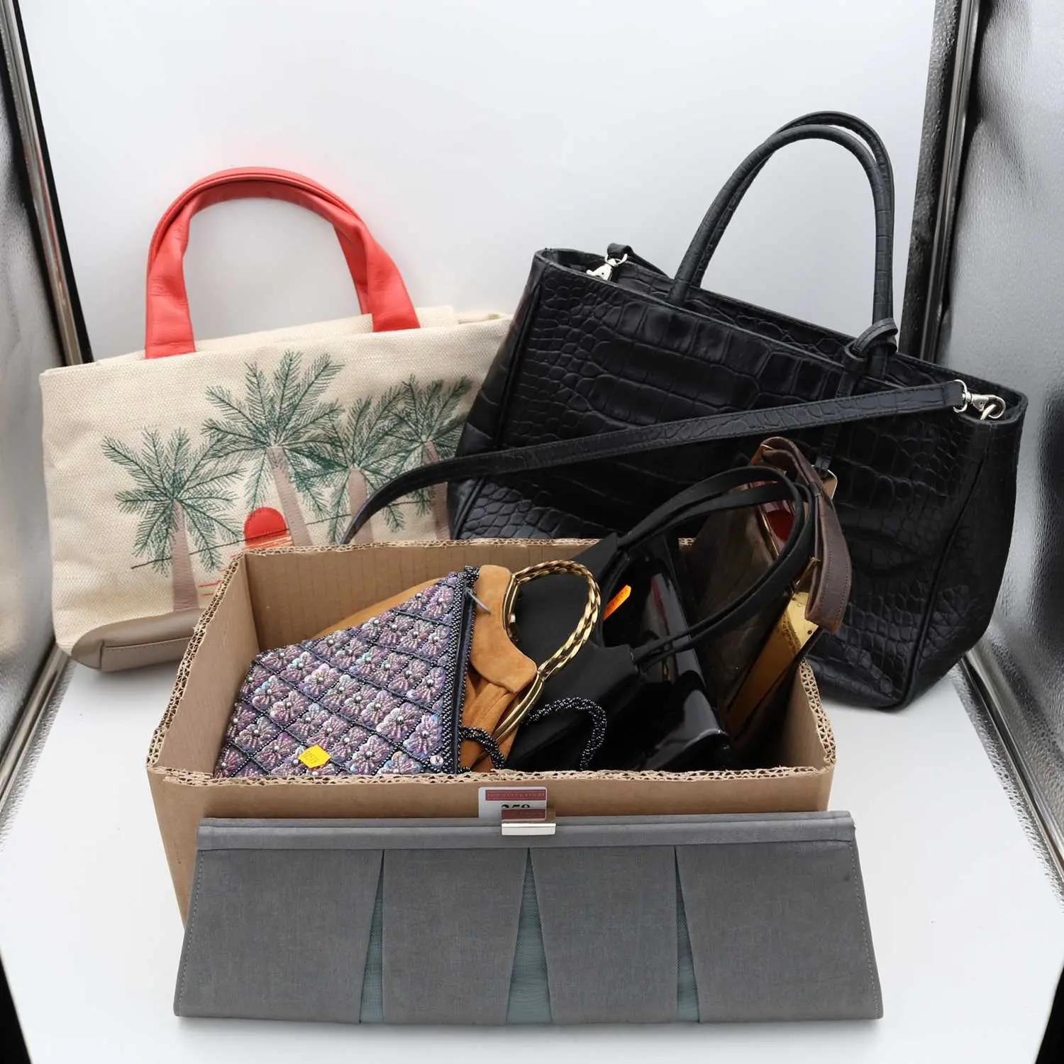 Lot 258 - A Furla black leather crocodile embossed