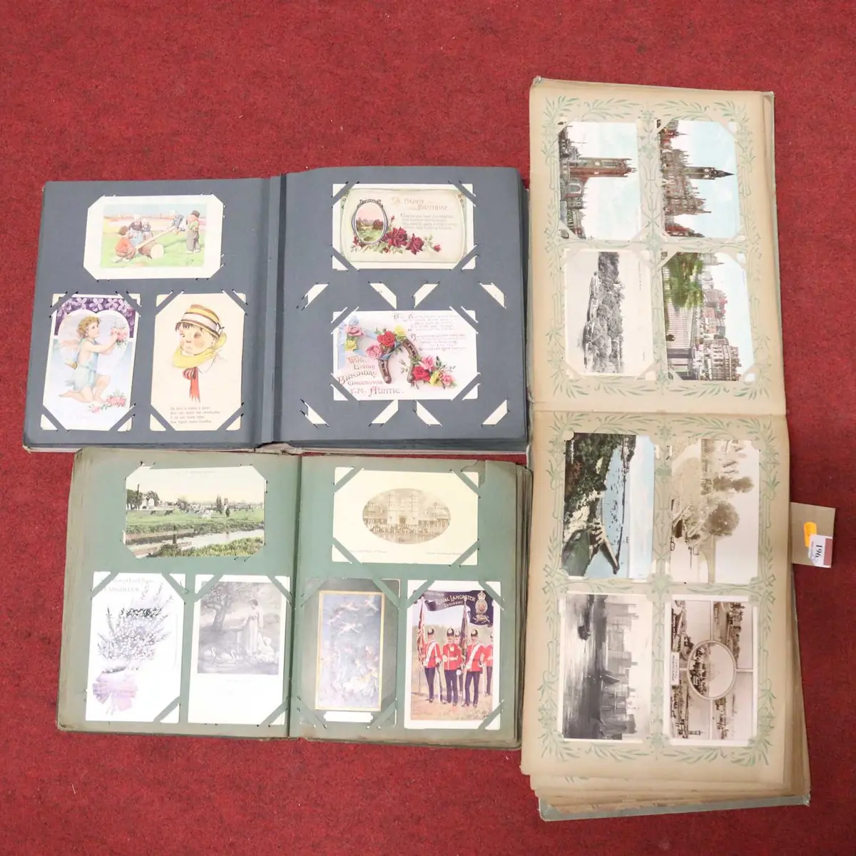 Lot 196 - Three postcard albums, early 20th century