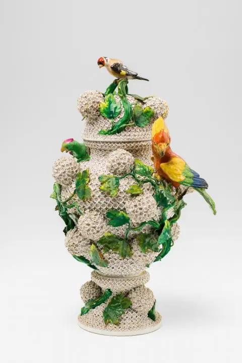 A Meissen porcelain snowball flower vase with birds