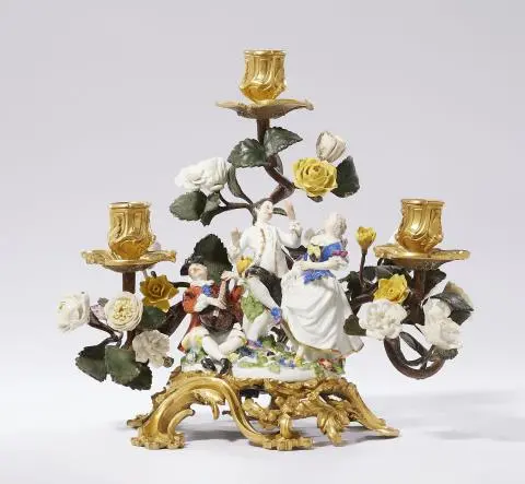 A three-flame candelabra with a Meissen porcelain music group