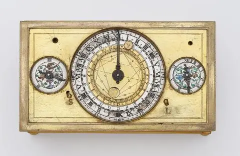 A table clock with an astronomical compendium