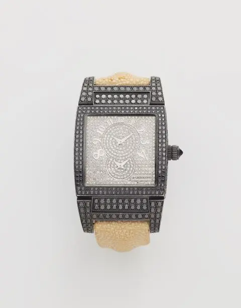 An 18k white gold PVD-coated and diamond De Grisogono wristwatch.