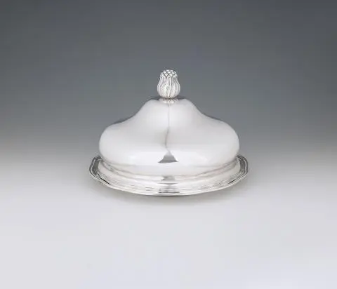 From the Dresden Court Silver Round dish with a warming cloche