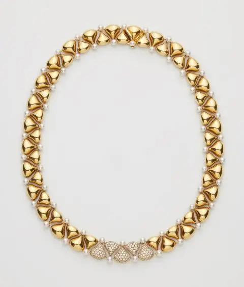 An 18k yellow gold diamond pavé and pearl Chopard "Pushkin" necklace.