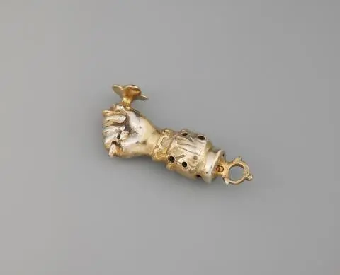A 17th century silver gilt figa pomander