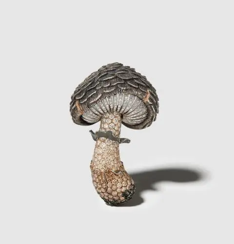 A one of a kind patinated silver and 18k gold white and fancy coloured