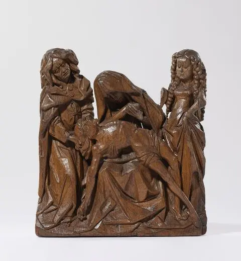 A carved oak Lamentation group