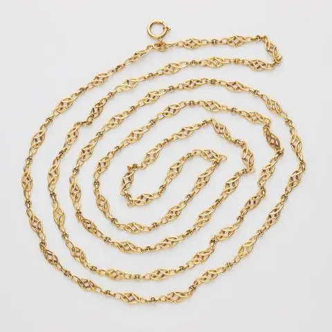 A long 14k gold Art Nouveau sautoir chain.