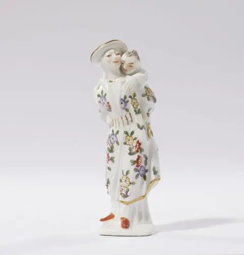A rare Meissen porcelain figure of a Japanese woman carrying a child