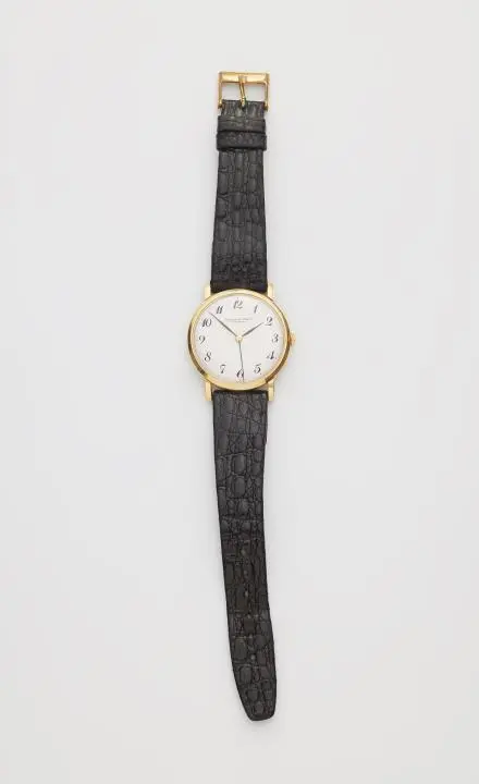 An 18k gold IWC manual winding gentlemen's wristwatch.