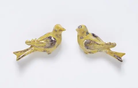 A pair of small Dutch Delft faience canaries