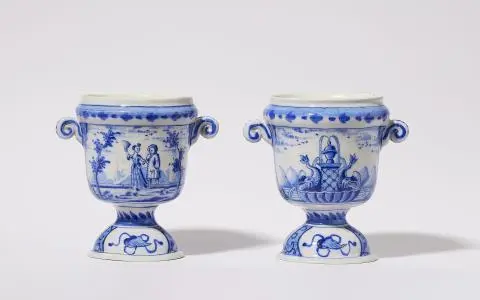 A rare pair of small Dutch Delft faience cachepots