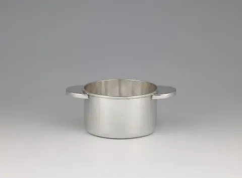 A rare silver bottle coaster by Emmy Roth