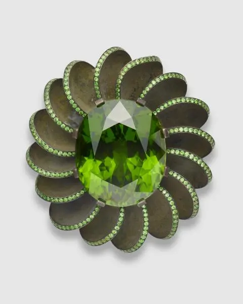 A green patinated silver blackened iron 18k gold and Russian demantoid
