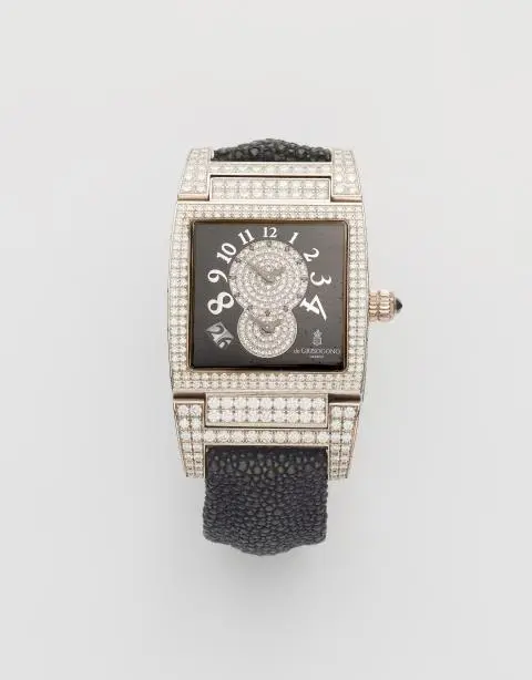 An 18k white gold and diamond De Grisogono wristwatch.
