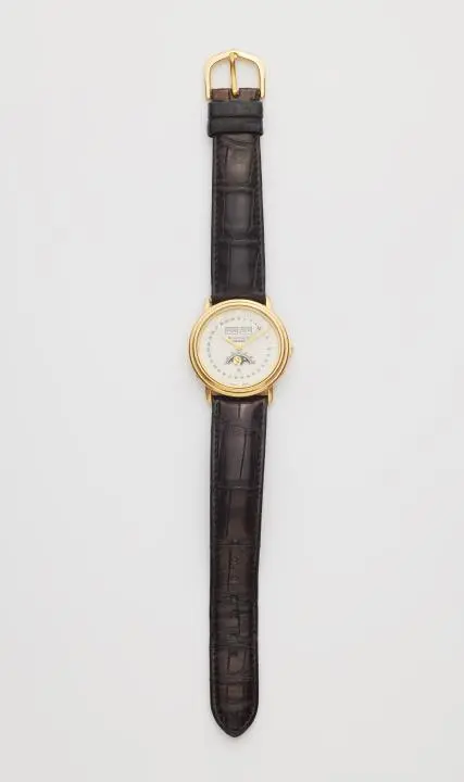 An 18k gold Blancpain Triple Date Moonphase gentlemen's wristwatch.