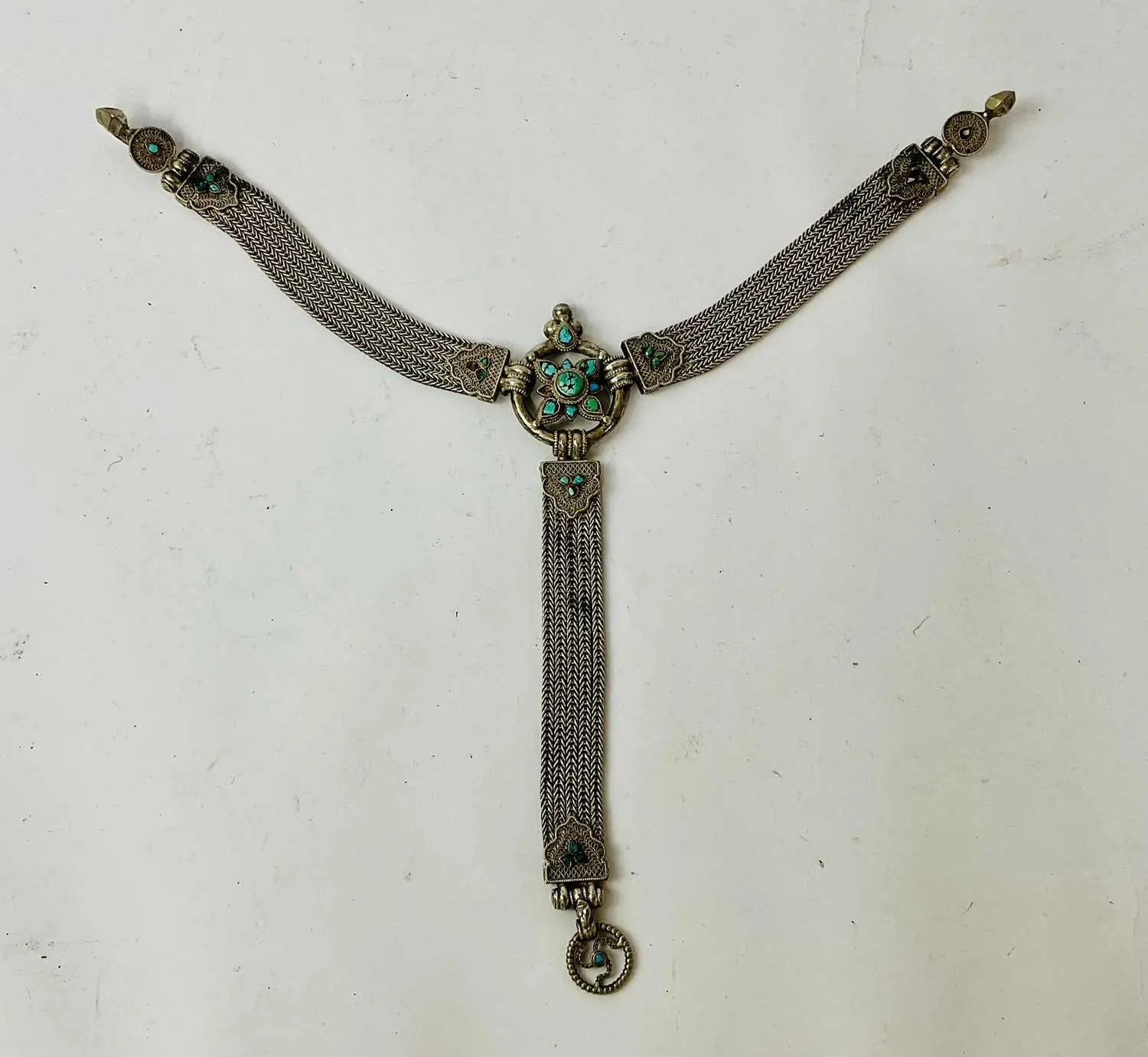 A 19th century Tibetan silver and turquoise belt ornament (Gyenzen)