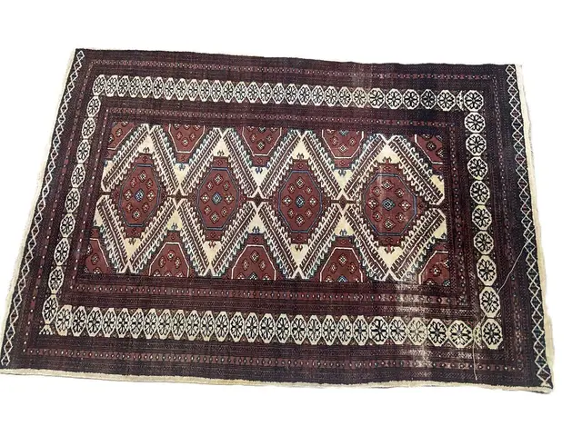 A machine woven Eastern style rug