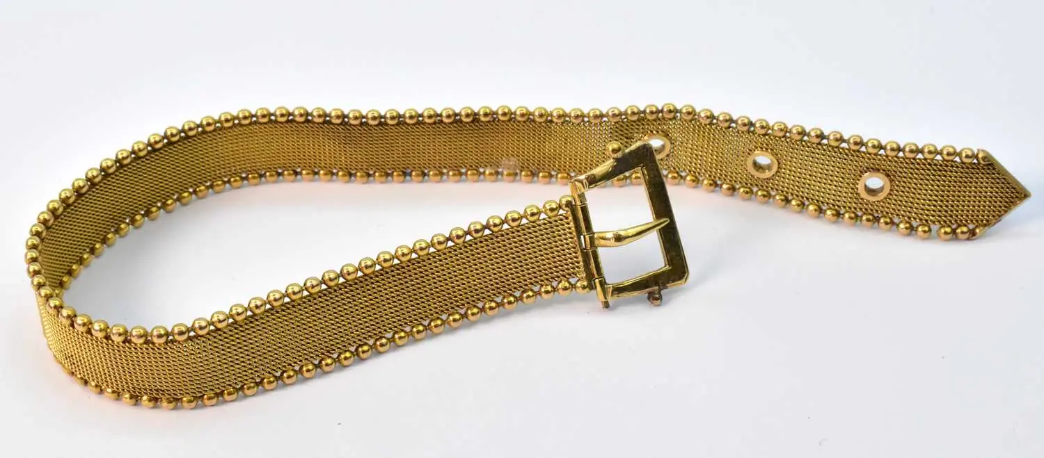 A vintage 15ct yellow gold braided belt and buckle strap bracelet