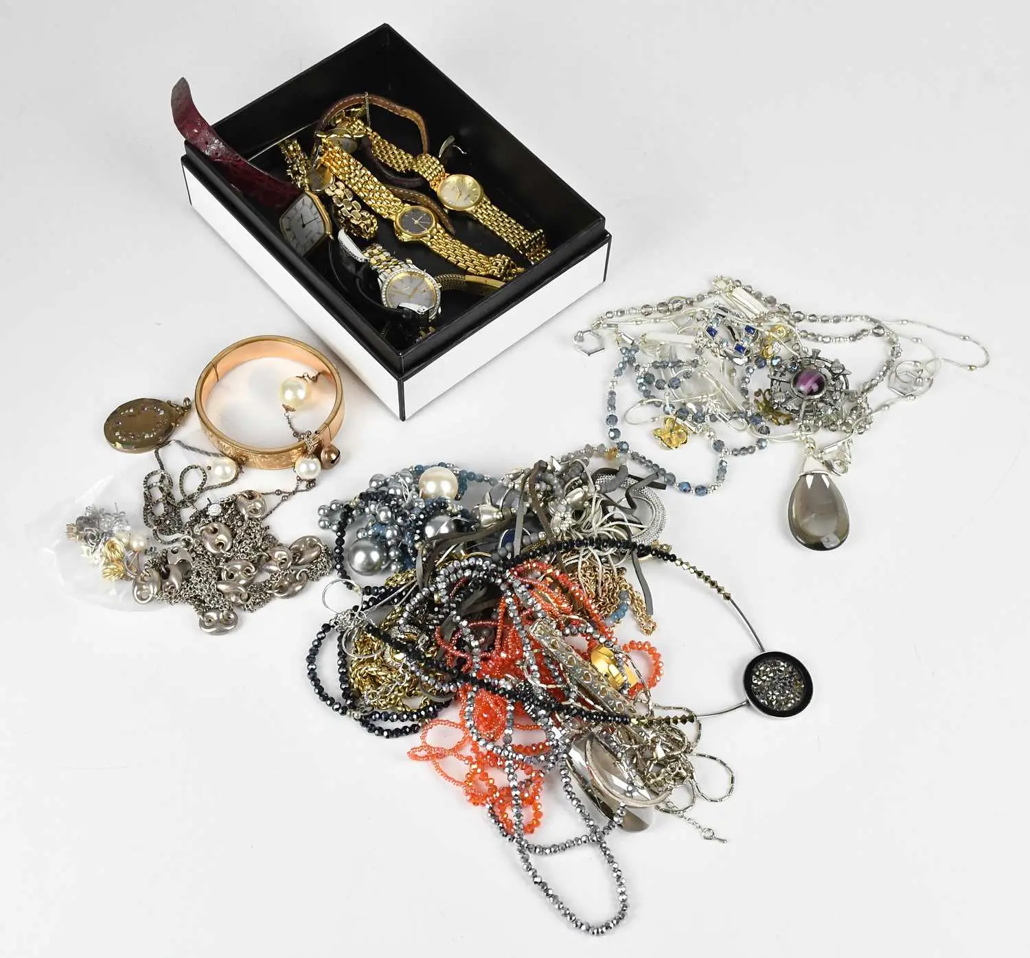 An collection of costume jewellery and dress watches