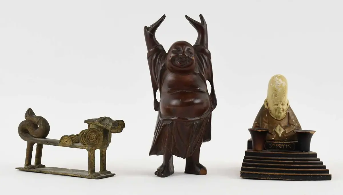 An African Benin bronze miniature figure of a dog