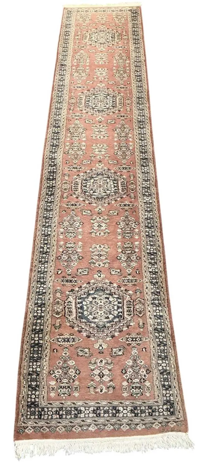 A modern Pakistani hand knotted woollen ground runner