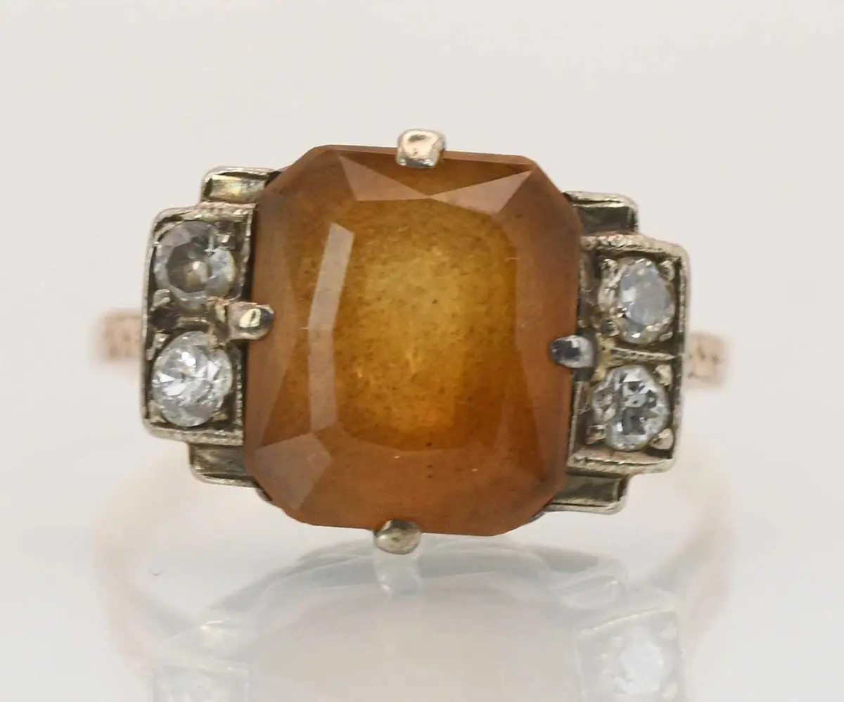 A yellow metal smoky quartz and diamond set Art Deco style cluster ring