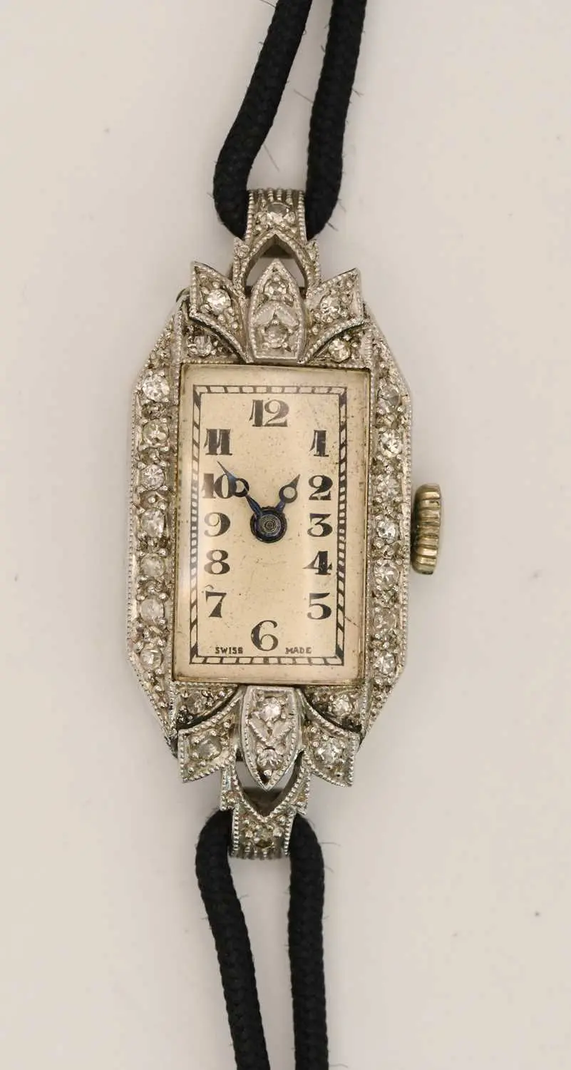 VERTEX; an 1920s/30s Art Deco platinum cased diamond set...