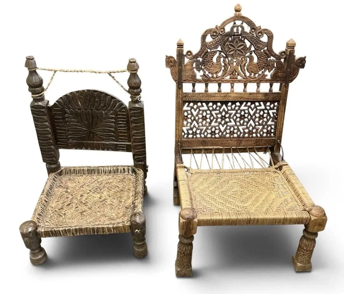 Two carved wooden pidha or temple chairs