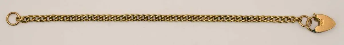 An 18ct yellow gold flat Cuban link bracelet