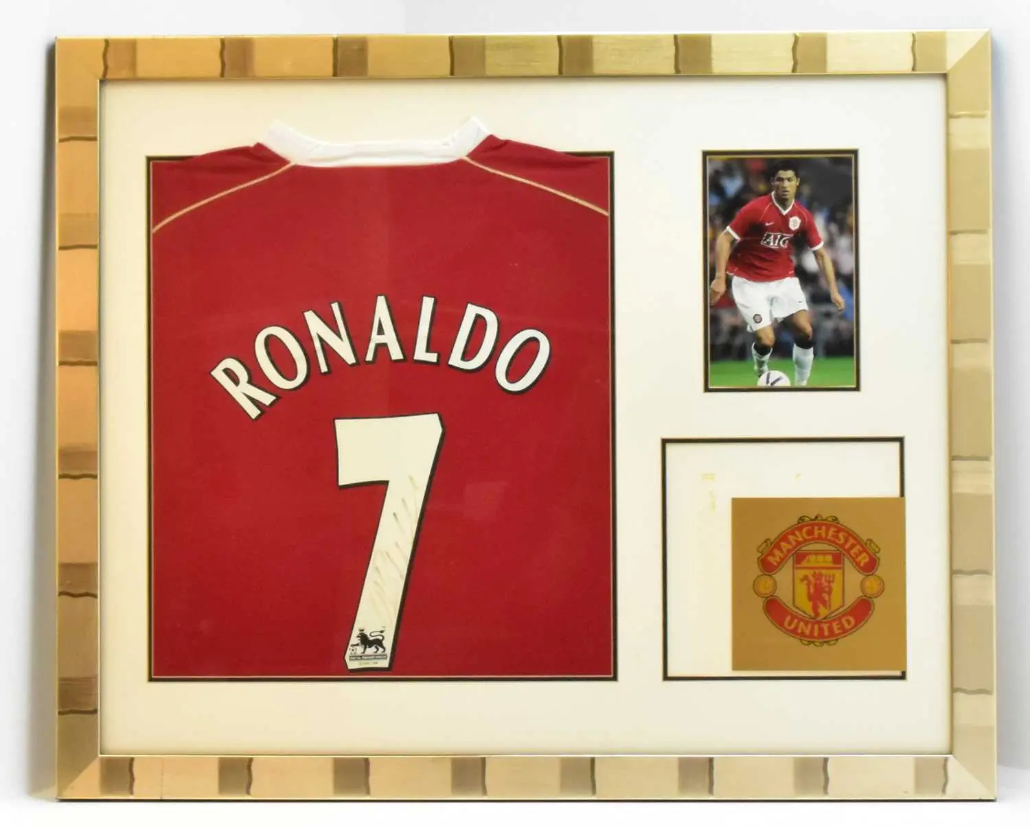 RONALDO; a framed display comprising a Ronaldo signed replica shirt
