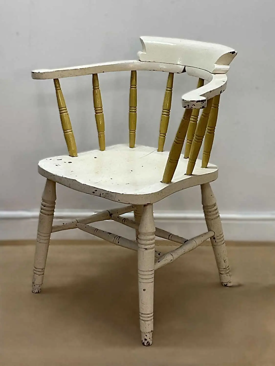 A 19th century painted wooden smoker's armchair