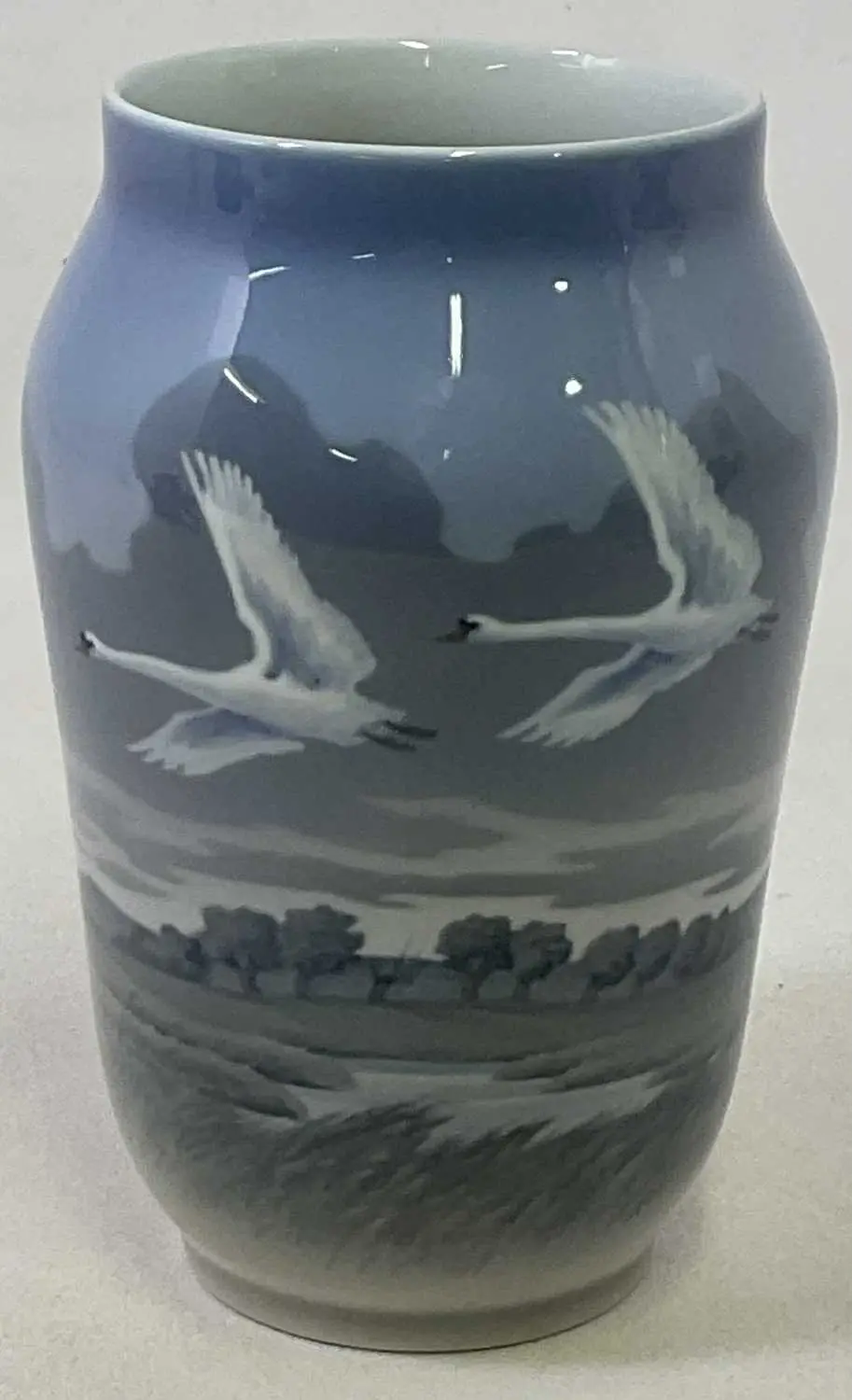 ROYAL COPENHAGEN; a large vase decorated with two swans in flight