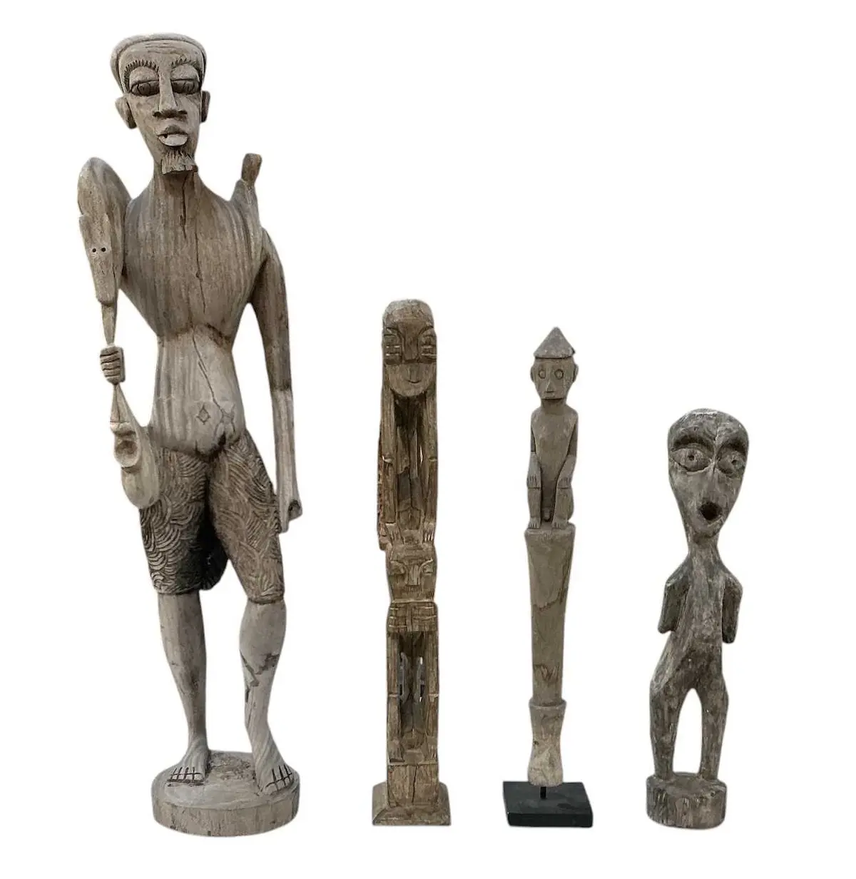 A large modern African carved wooden tribal figure of a standing gentleman