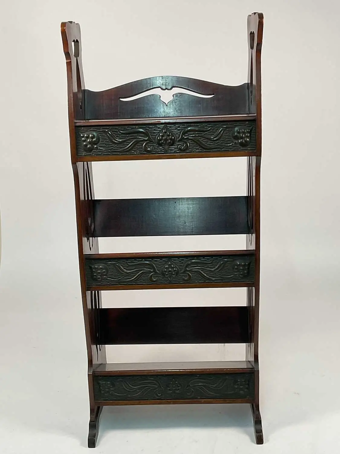 A mahogany Art Deco book trough