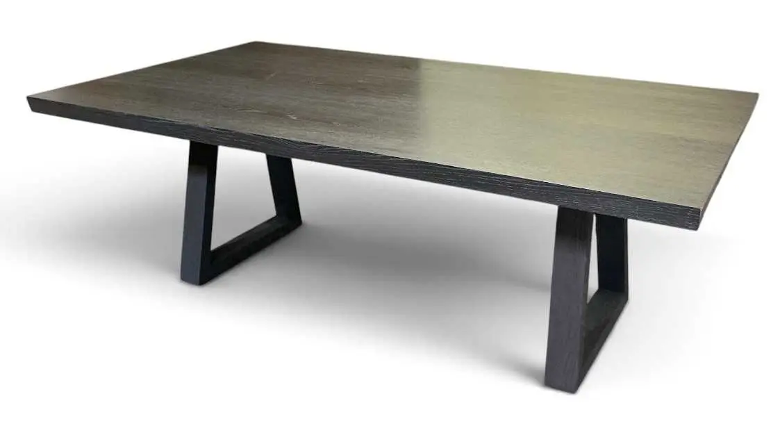 A modern contemporary ebonised rectangular dining table