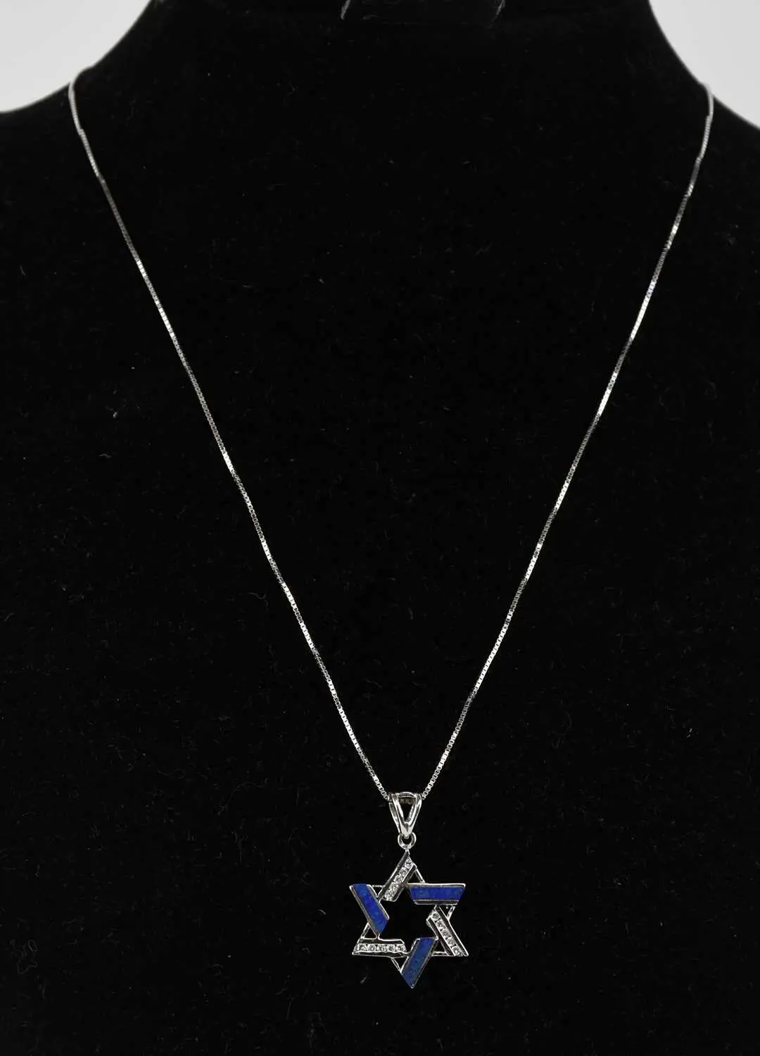 A 14ct white gold Star of David pendant
