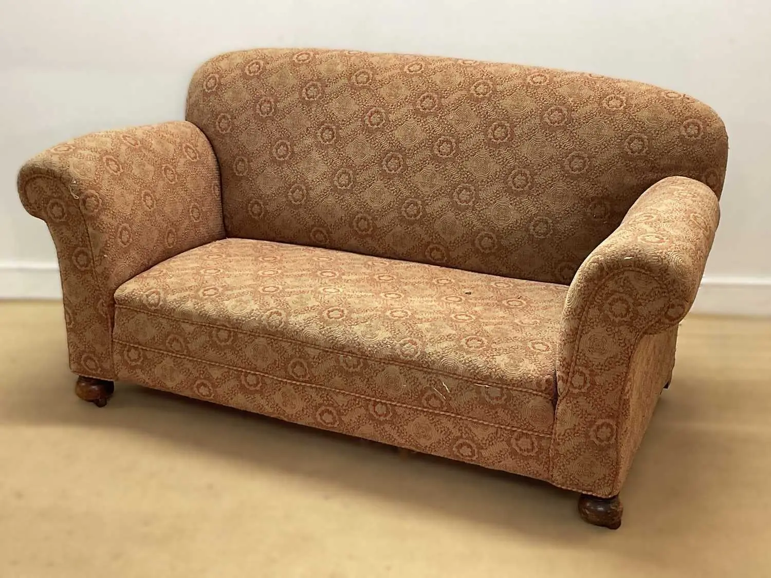An early 20th century drop end sofa