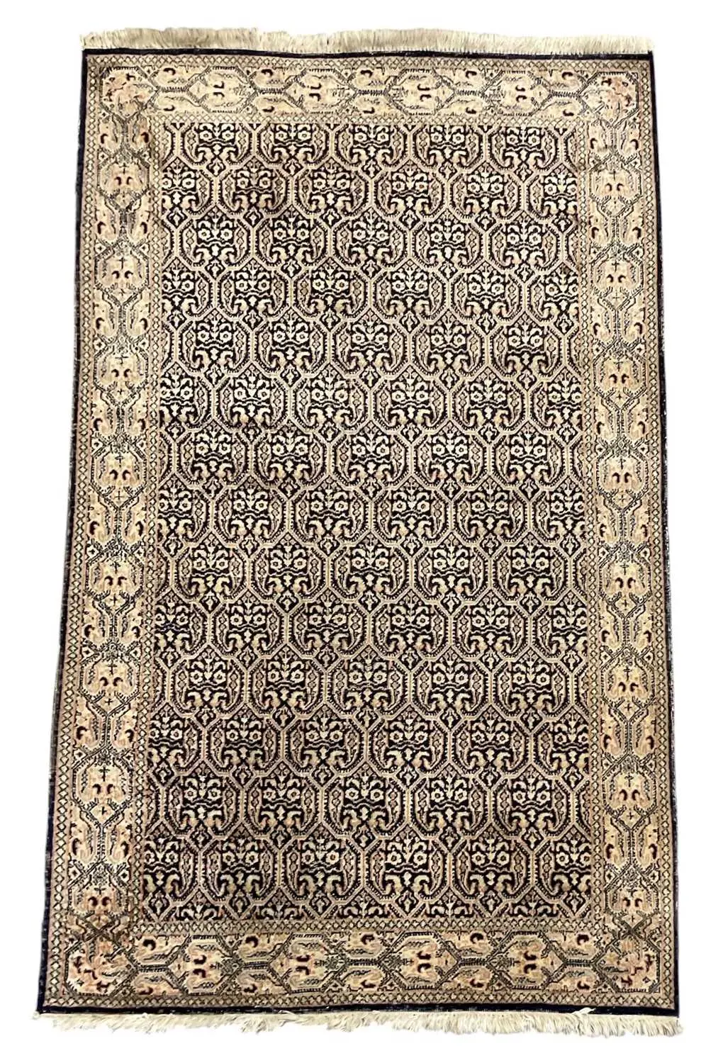 ROYAL DESIGN; an Oriental handmade silk ground rug